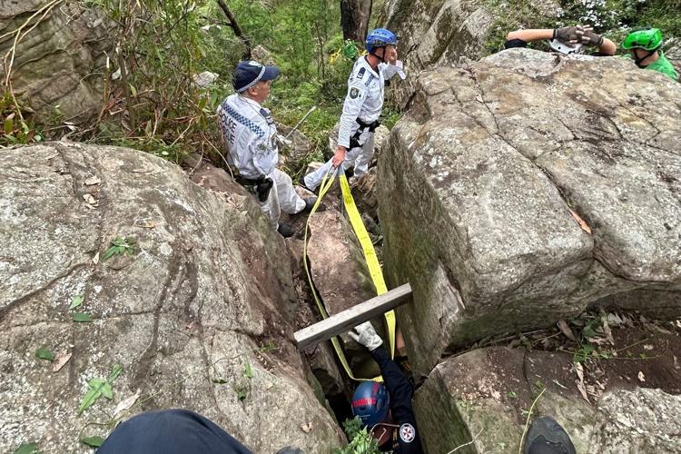 Woman wedged upside down between rocks for 7 hours after trying to retrieve her phone