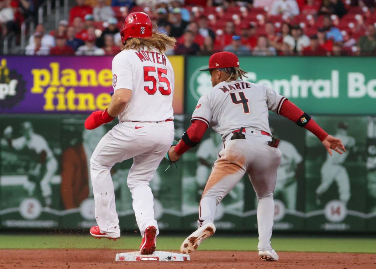 Willson Contreras #40 of the St. Louis Cardinals and Jordan Hicks #12 of  the St. Louis Cardinals hug after they win the game after the 2023 MLB  London Series match St. Louis