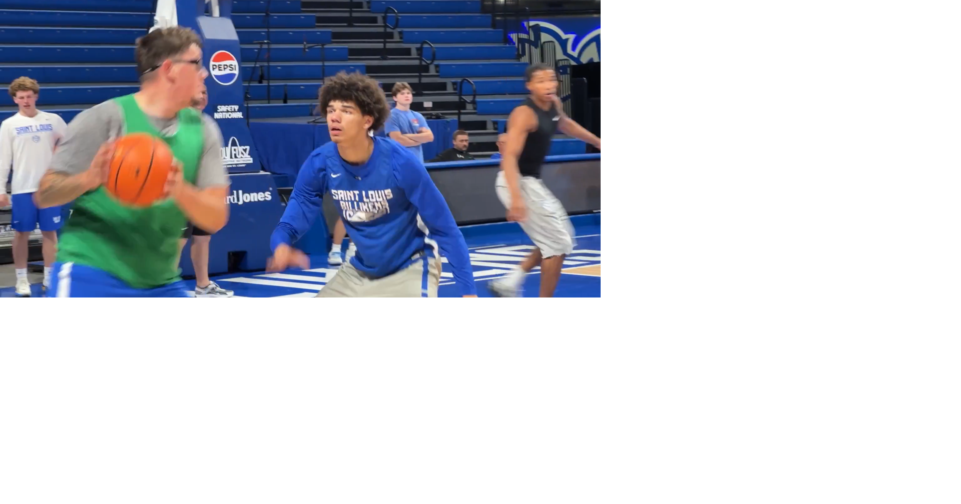 Robbie Avila practices with St. Louis University men's basketball team
