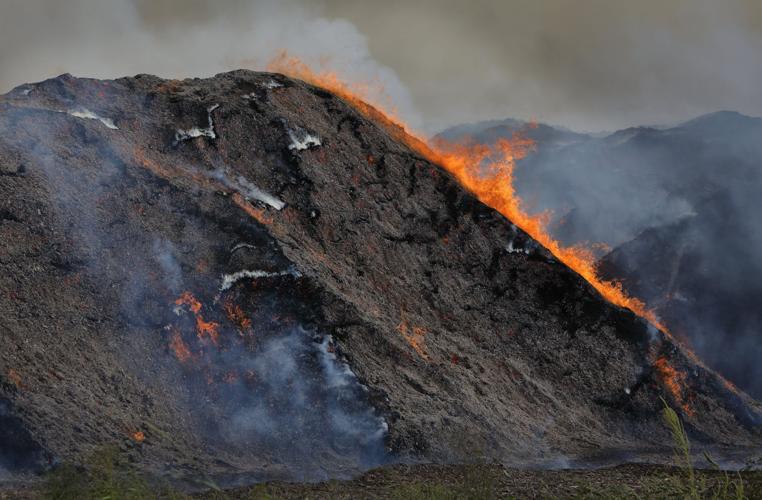 Persistent mulch fire still burning at Sauget lawn and garden store