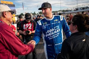 NASCAR O'Reilly Auto Parts Series driver Austin Hill greets fans before the Sports Illustrated Resorts 250 at Nashville