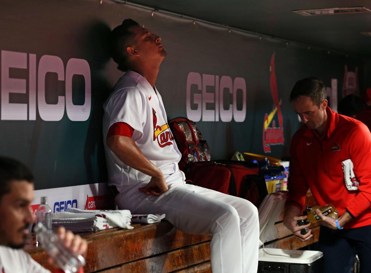 Los Angeles Angels' Jake Lamb is congratulated by third base coach