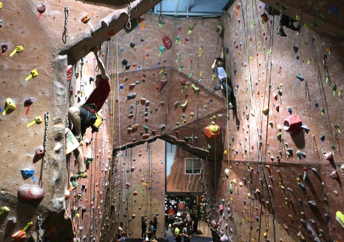 Rock climbers gravity at St. Louis gym Health