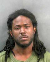 Shooter charged in killing of man in parked car, 51 police say
