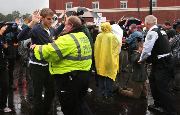 Clergy demonstrates at Ferguson Police Department