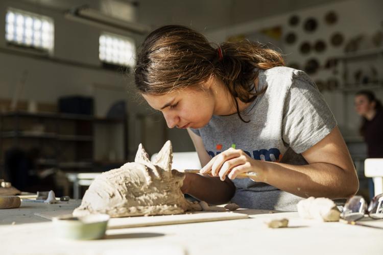 Neurodivergent students learn ceramics in art workshop