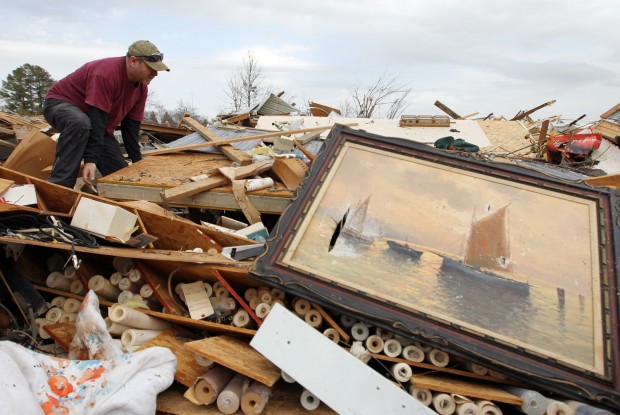 Harrisburg Tornado Aftermath- Joe Milligan searching among rubble