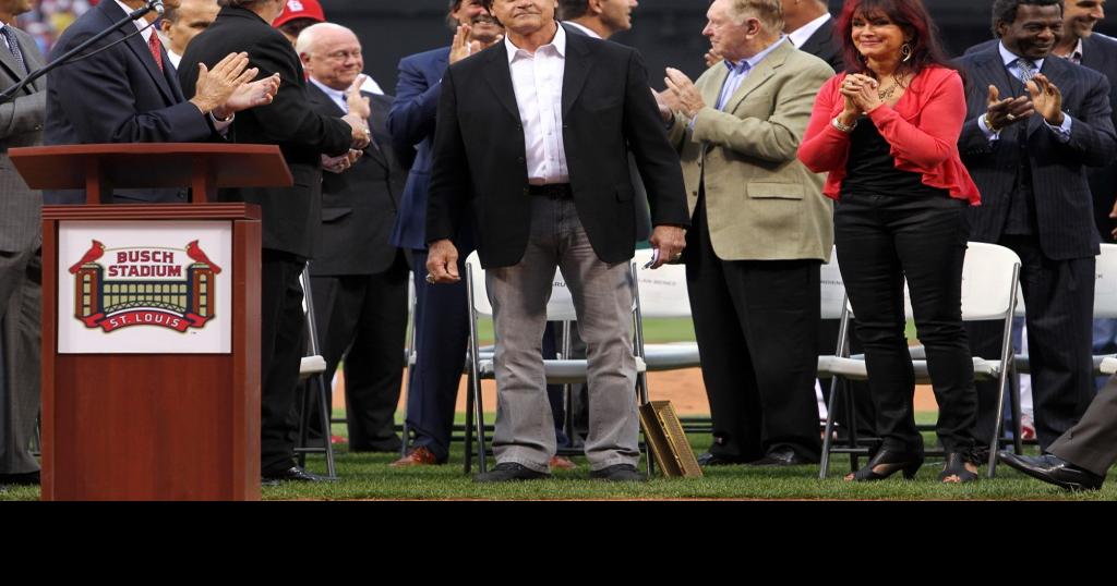 St. Louis Cardinals manager Tony La Russa hugs wife Elaine and daughter  Devon during a celebration ceremony for the new World Champions at Busch  Stadium in St. Louis on October 29, 2006.