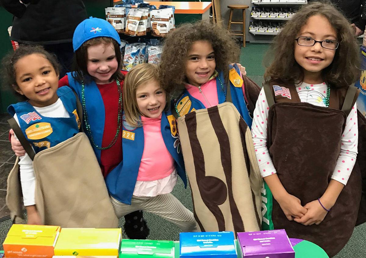 Girl Scouts Selling Cookies At A Community Booth Near You 6247