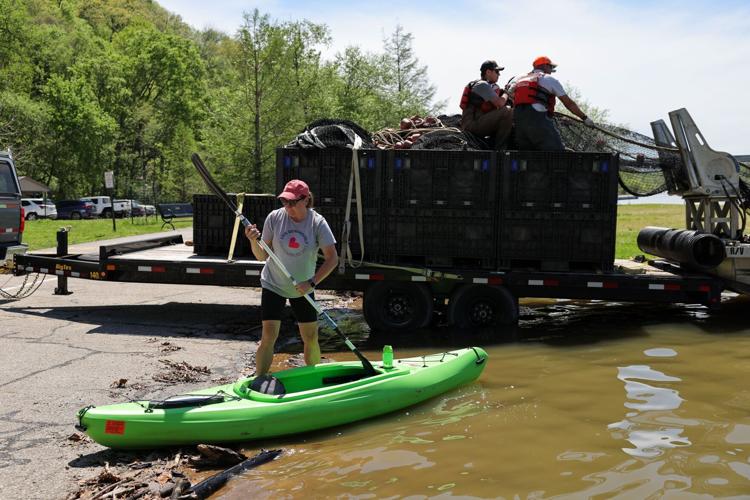 USGS collects nets and conducts research in effort to minimize invasive carp fish at Creve Coeur Lake