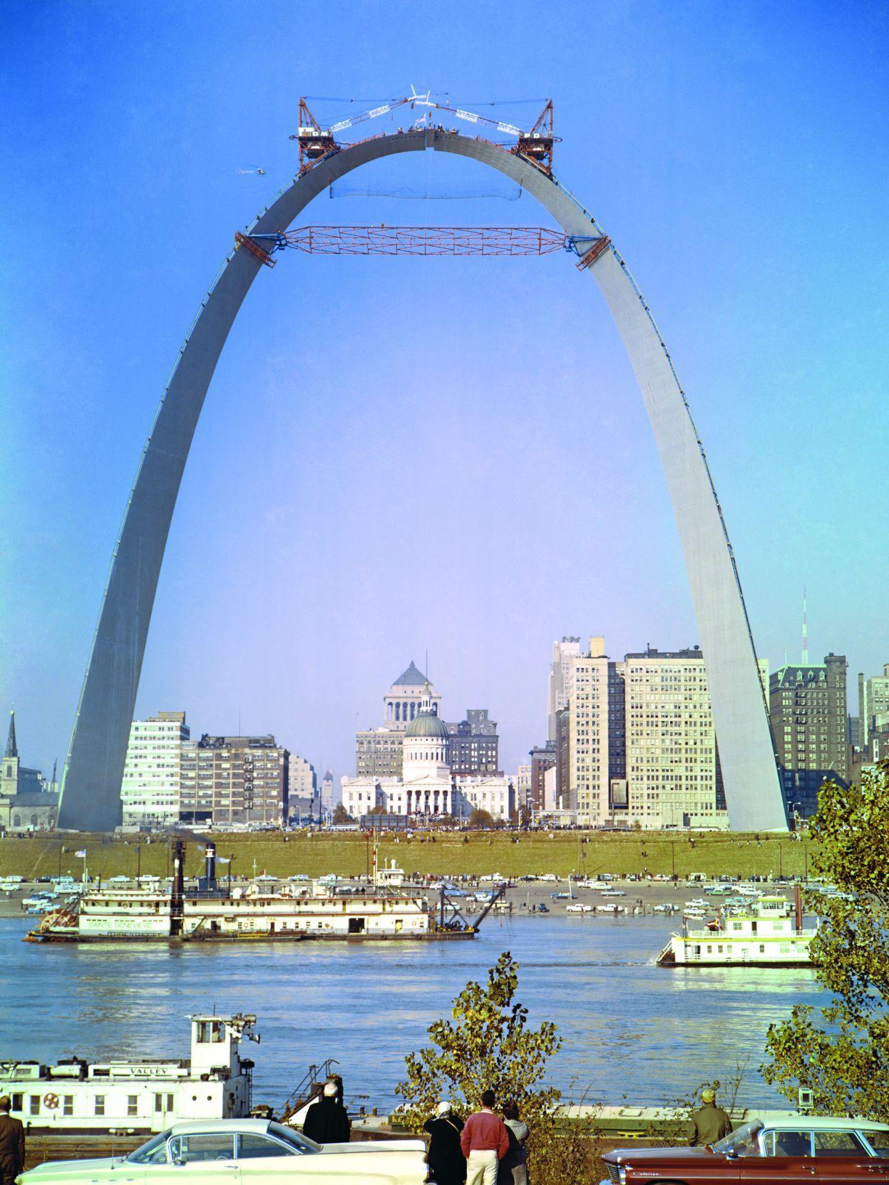 Oct. 28, 1965: The last piece of the Arch is fitted into place. See the
