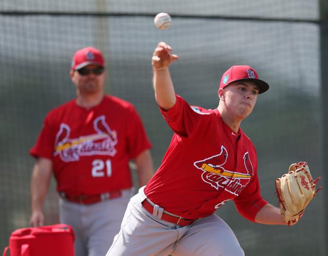 Photos Cardinals open camp with pitchers throwing first bullpen session