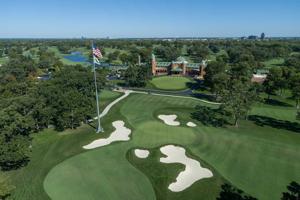 Aerial view of the 18th hole at Medinah No. 3 with the iconic clubhouse in the background.