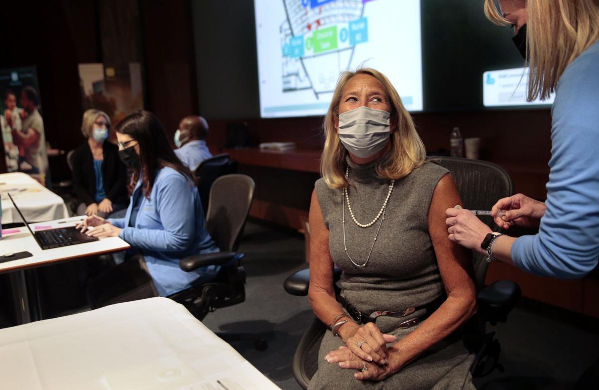 Corporations begin vaccinating their employees against COVID-19