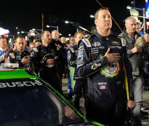 Kyle Busch stands for the the national anthem at Daytona International Speedway on Feb. 12, 2026.