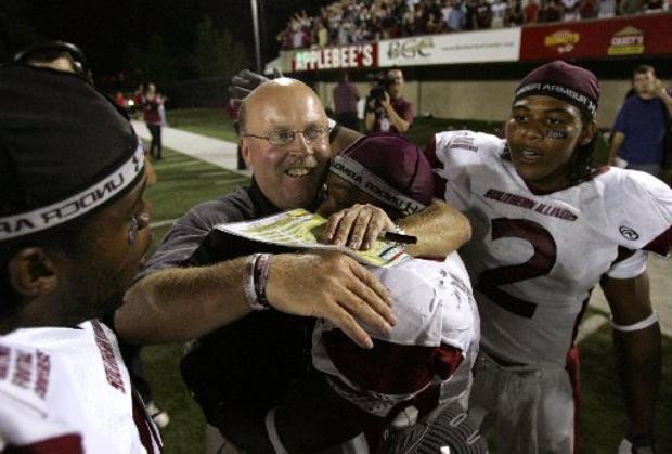 Jerry Kill, in a 2007 photo after is SIU Salukis upset Northern Illinois. (AP Photo)