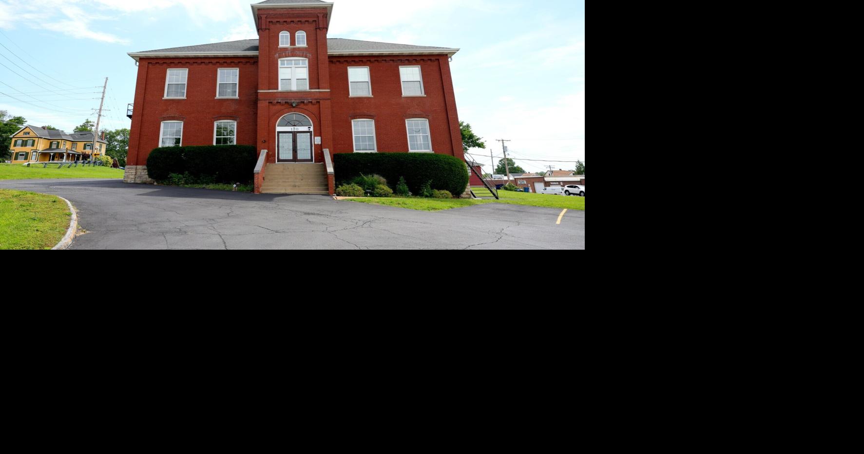 Manchester residents can weigh in on car dealer's plan to renovate historic school