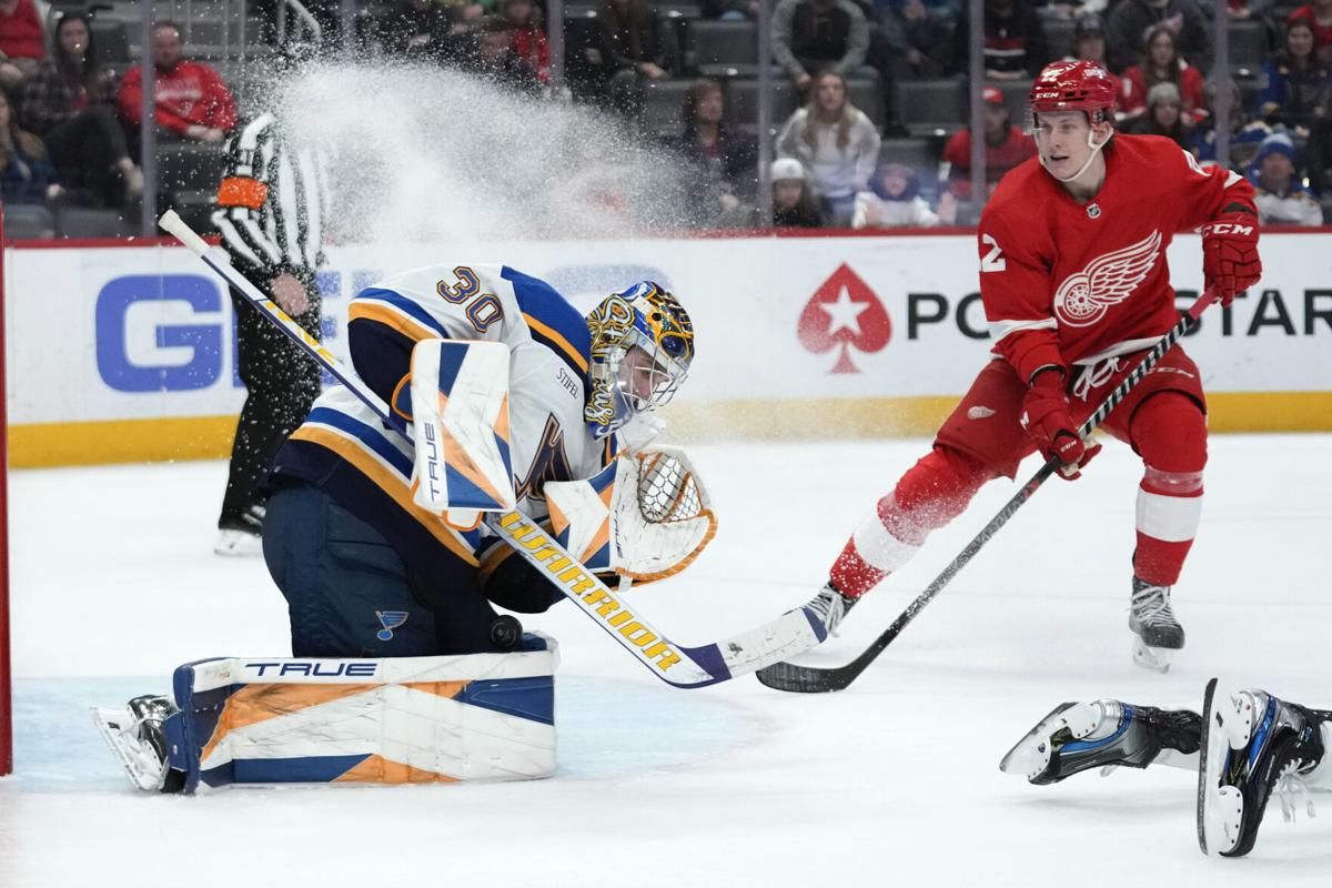 Detroit Red Wings' Matt Luff laughs off taking puck to the head