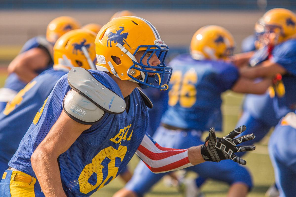 Bell, Guehne chase glory one sack at a time High School