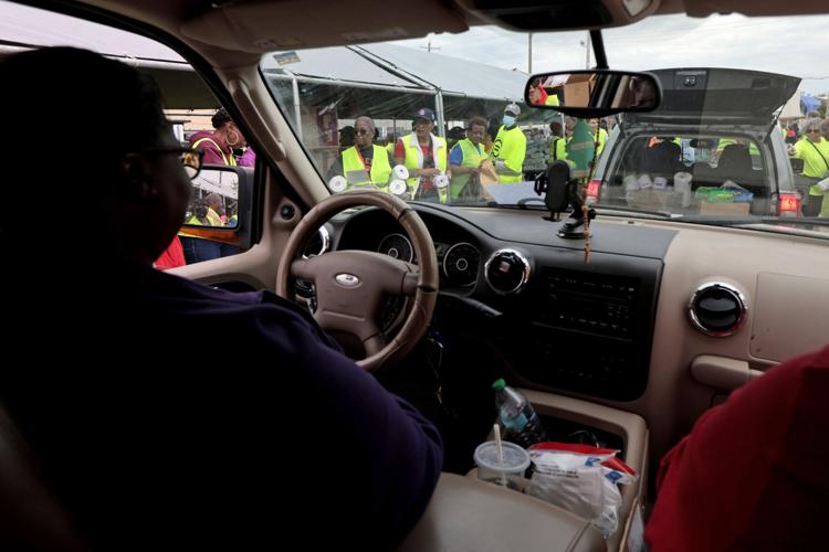 Cars wrap around the block twice over for Urban League large-scale distribution event