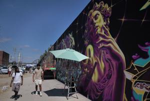 Paint St. Louis puts new art on an old downtown St. Louis wall