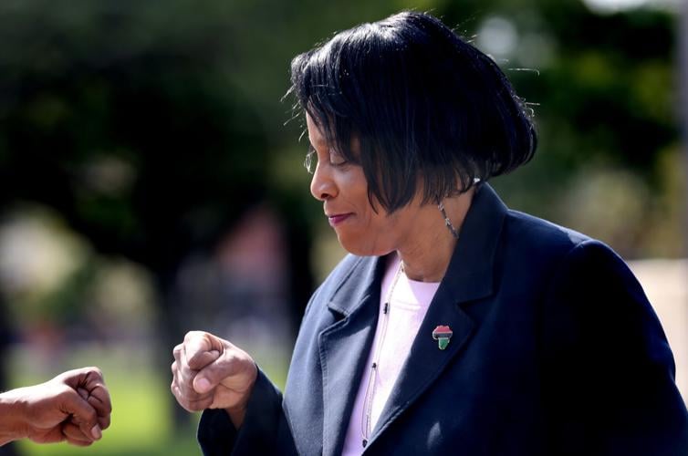 First Ward incumbent Alderwoman Sharon Tyus campaigns on election day