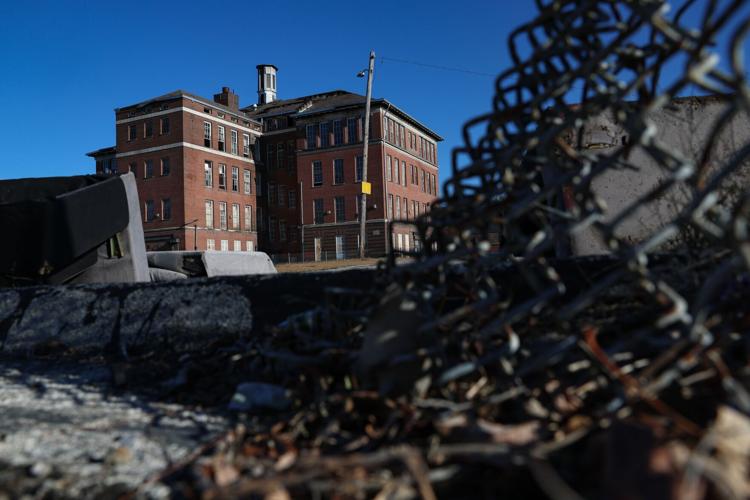 City offers to buy former Marshall School and Cleveland High School