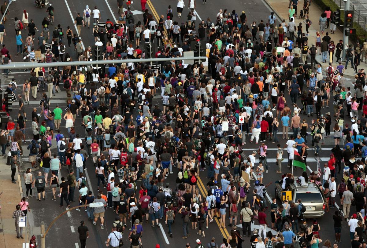 Protesters spend day at police headquarters