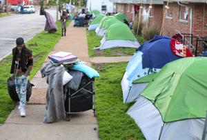 Remaining tenants forced out, again, after camping on condemned property