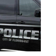 Florissant police shoot out car window after officer dragged