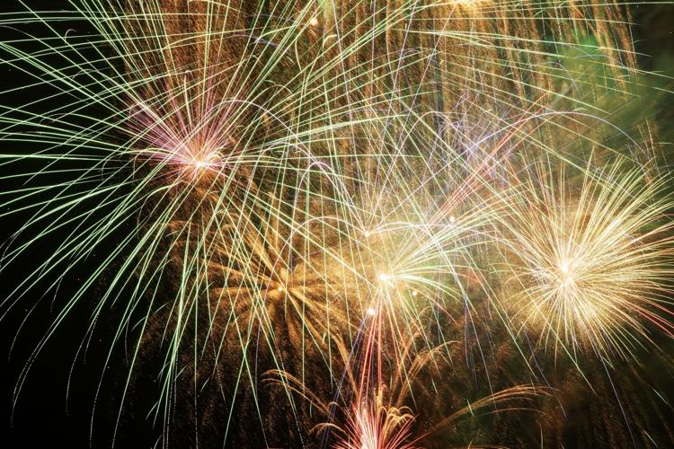 Fireworks illuminate the sky in Alton