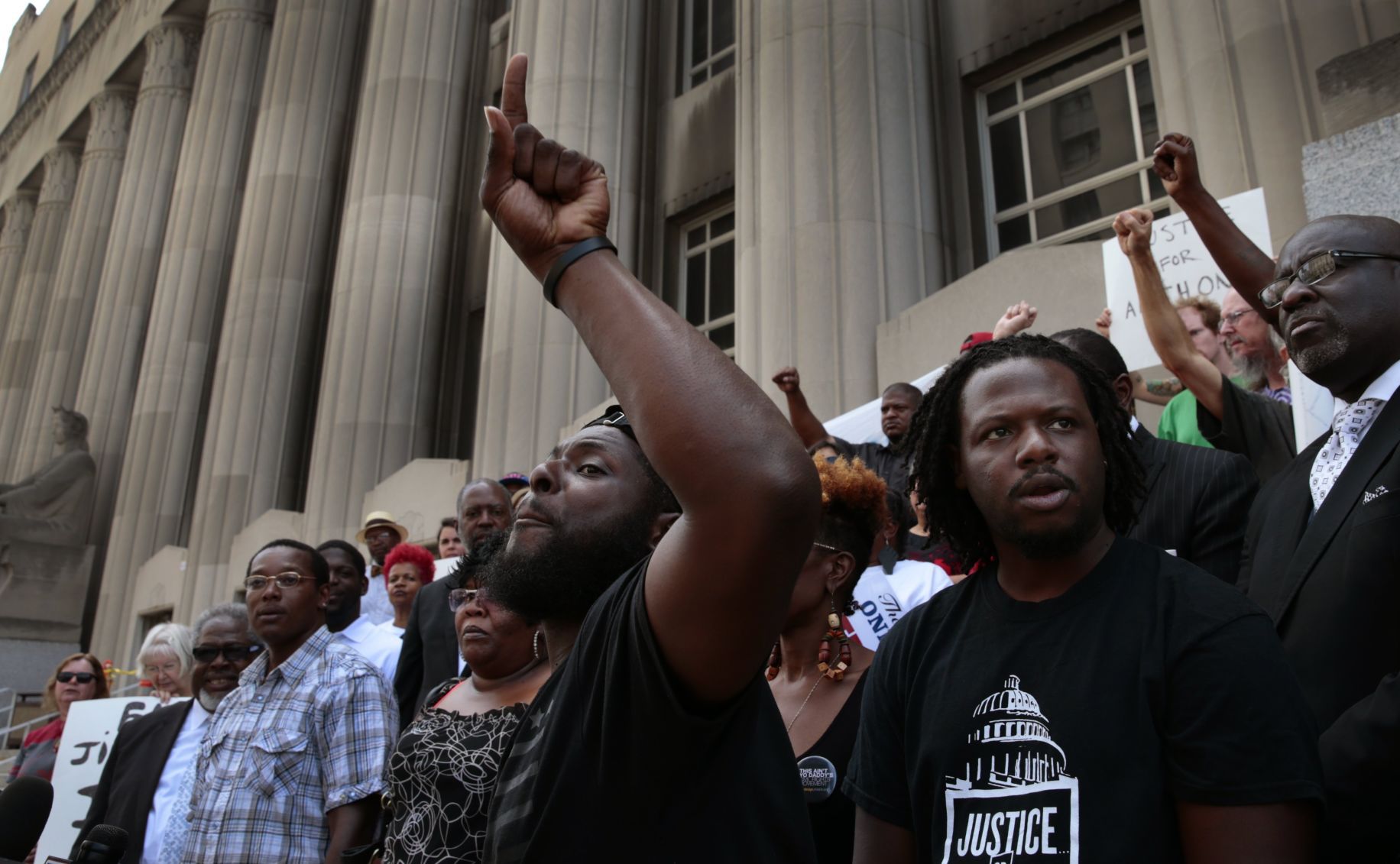 White ex-St. Louis cop acquitted in black suspect's killing