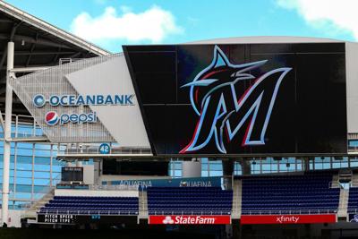 The Miami Marlins logo on the scoreboard at Marlins Park in Miami prior to a game against the Colorado Rockies on March 29, 2019.
