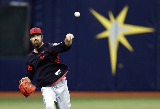 Cleveland Indians pitcher Andrew Miller throws to the Minnesota