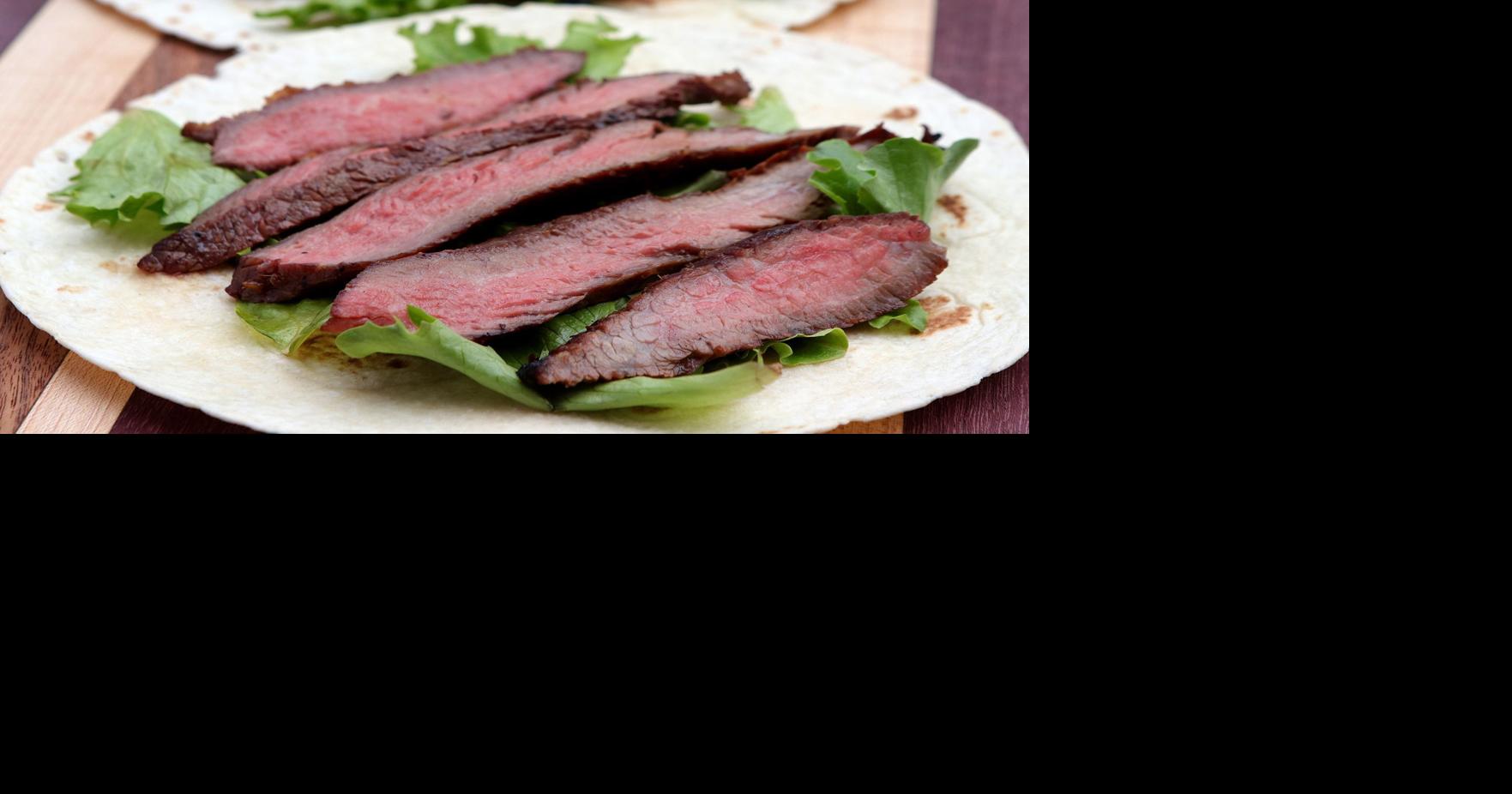 KoreanStyle Marinated Skirt Steak with Grilled Scallions and Warm