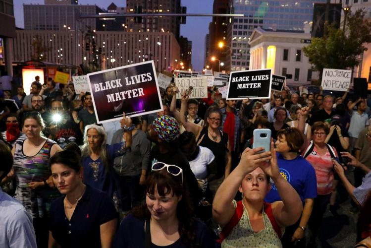 Protesters march in downtown St. Louis
