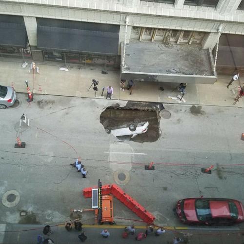Sinkhole swallows Camry in downtown St. Louis