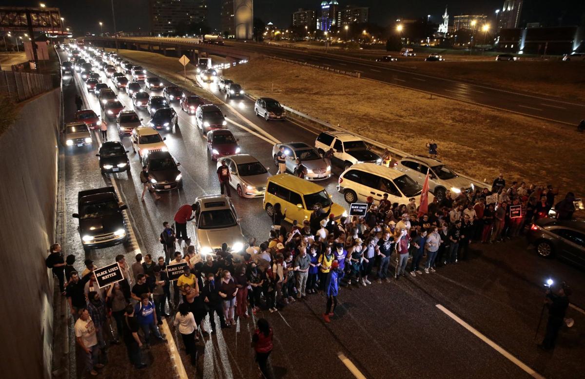 Protesters shutdown Interstate 64 at Compton Avenue