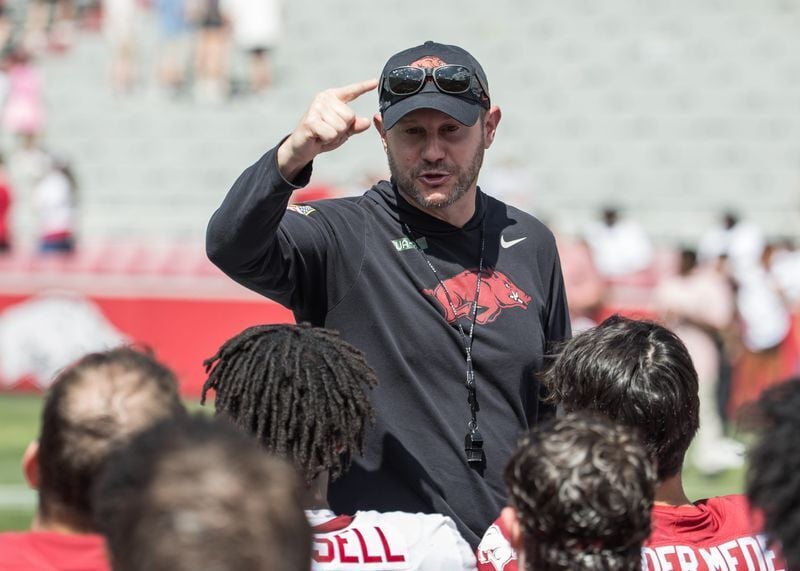 Arkansas football coach Ryan Silverfield talks to his team after their spring game at Donald W. Reynolds Razorback Stadium.
