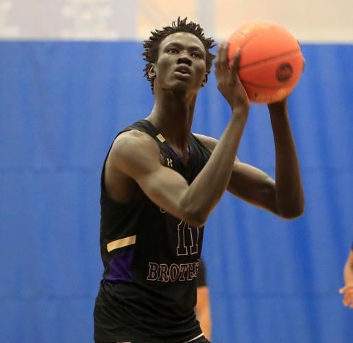 Manute Bol's son looks to follow in his father's very large