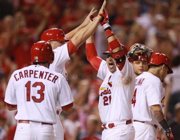 Carpenter, Cardinals slam Reds