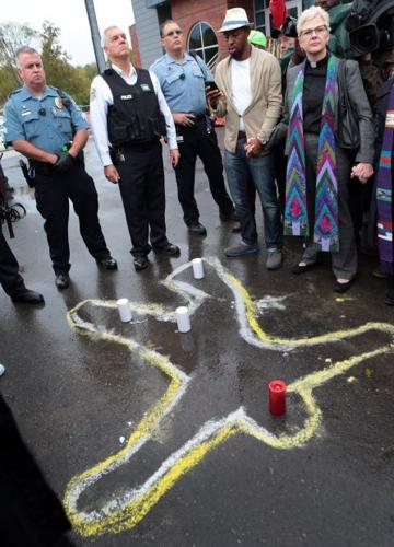 Clergy demonstrates at Ferguson Police Department