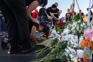 Community holds vigil for Overland couple slain after deportation