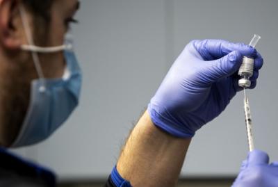 Staff receive COVID-19 vaccinations at  SSM Health Saint Louis University Hospital