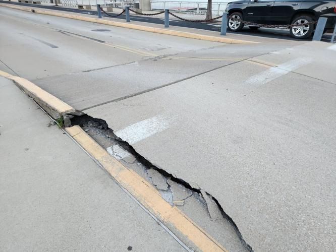 Buckling pavement near Gateway Arch