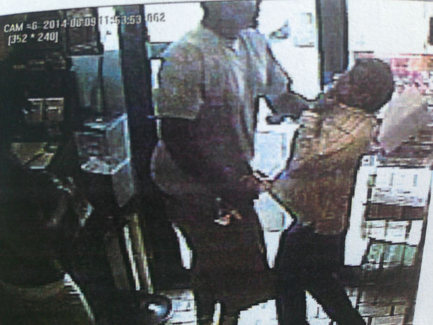Surveillance image of robbery tied to Michael Brown shooting