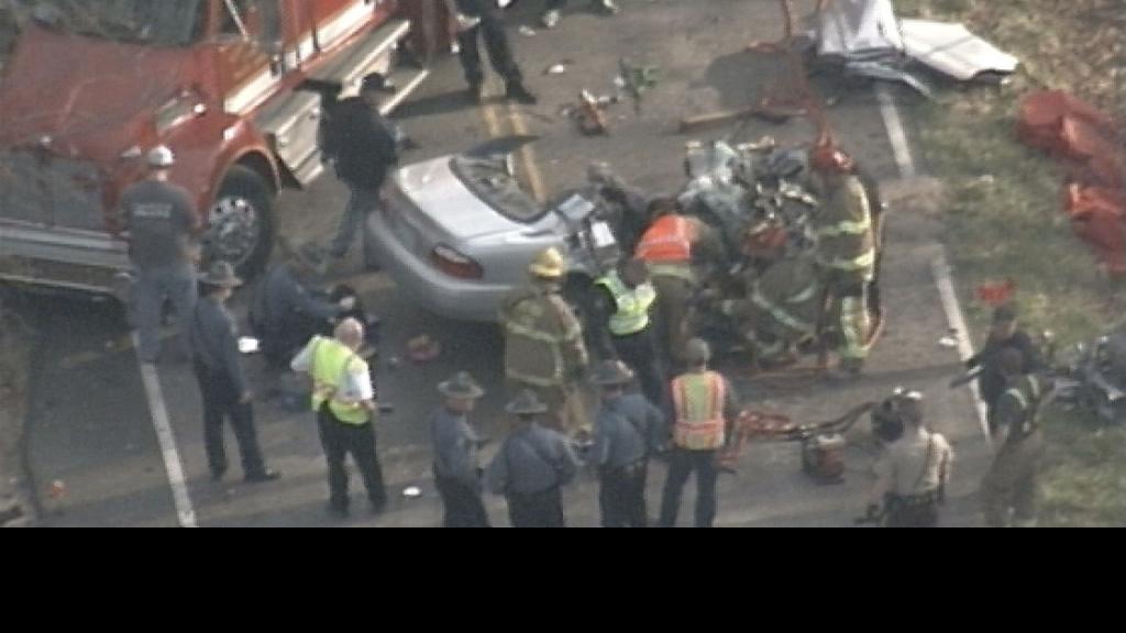 Driver passing on a hill caused wreck that killed three near Sullivan