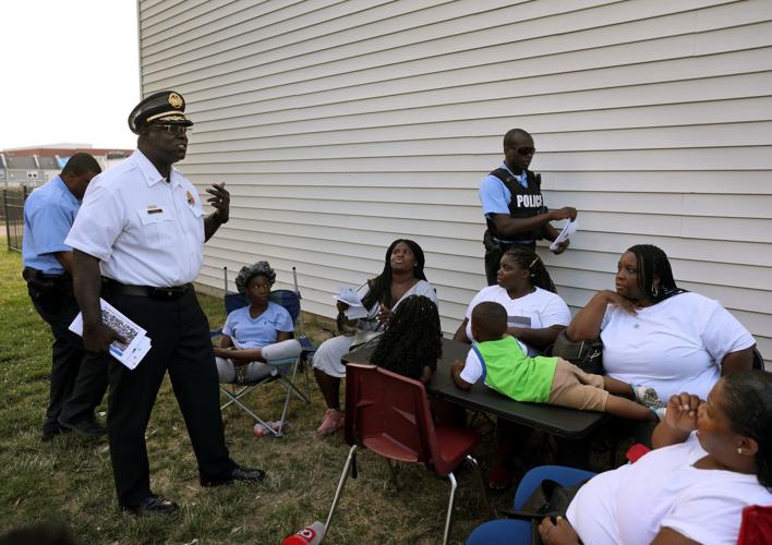 St. Louis police chief John Hayden walks Clinton-Peabody housing complex