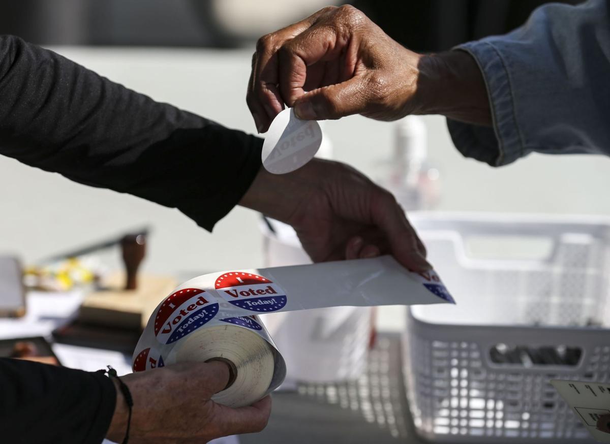 St. Louis County voters drop off ballots