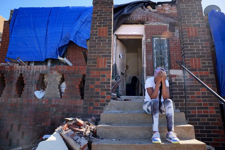 Tornado leaves residents reluctant to separate from damaged property